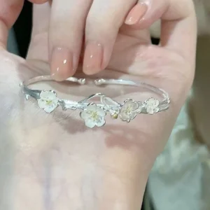 RENSINO Adjustable Silver Tone Bracelet for Women Open Bangle with Cherry Peach Blossom Pendant for Weddings and Parties