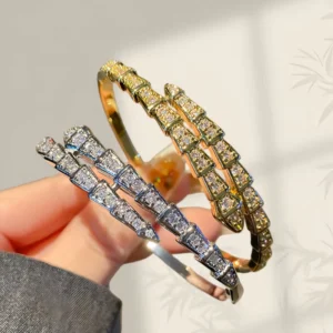 RENSINO Cross border Demi luxury Trendy Open ended Half circle Diamond Animal Pattern Snake Bangle Women High grade Copper plated 18K