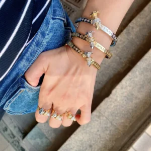 RENSINO Designer Cubic Zirconia 18K Gold Plated Bangle Jewelry European Inspired Nail Detail Bangle Luxury
