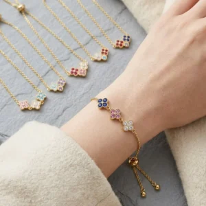 RENSINO High-End Luxury Inlaid Diamond Four-Leaf Clover Pull Bracelet Women’s Flower Petals Stainless Steel Electroplated Hand