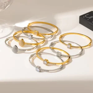 RENSINO High Quality Dainty Design Stainless Steel Waterproof Trendy 18K Gold plated Geometric Zircon Snap Bracelet for Women