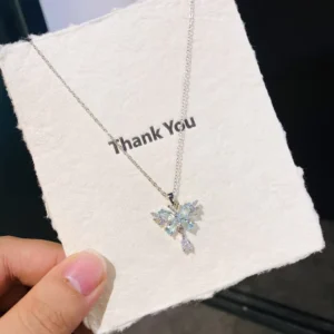 RENSINO Silver Tone Blue Crystal Butterfly Pendant Necklace with Teardrop Zircon Tassel Elegant Women’s Jewelry for Wedding