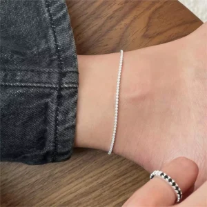 RENSINO Sporty Chic Anklet Sterling Silver Tennis Line Bracelet for Ankle Adjustable Dainty Jewelry Perfect Gift for Active Lifestyle