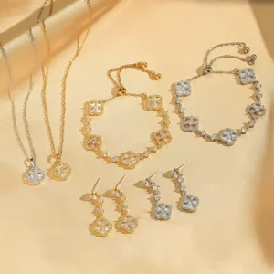 RENSINO Stainless Steel Clover Necklace Earrings Bracelet Set Inlaid With Seashell Full Of Diamonds Light Luxury Jewelry Set For Women