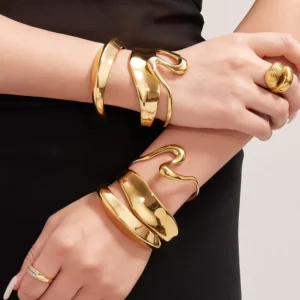 RENSINO Trendy Stainless Steel Bracelet Jewelry 18K Gold Plated Open Curved Texture Bangle Fading Hypoallergenic Bracelets for Women