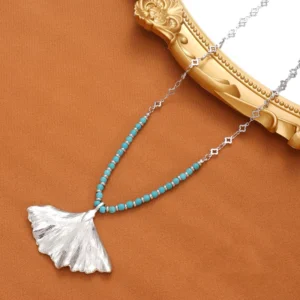 RENSINO Vintage Inspired Copper Flower Pendant Necklace Boho Chic Turquoise Beaded Chain Festival Style Jewelry For Unisex